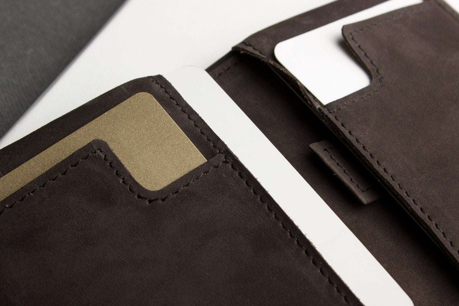 Kiko Slim Bifold Wallet handcrafted soft leather with 2 card slots and quick-access pocket holding folded cash