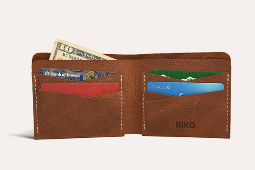 Buck Bifold Leather Wallet in smooth cowhide with contrast stitching and multiple card slots