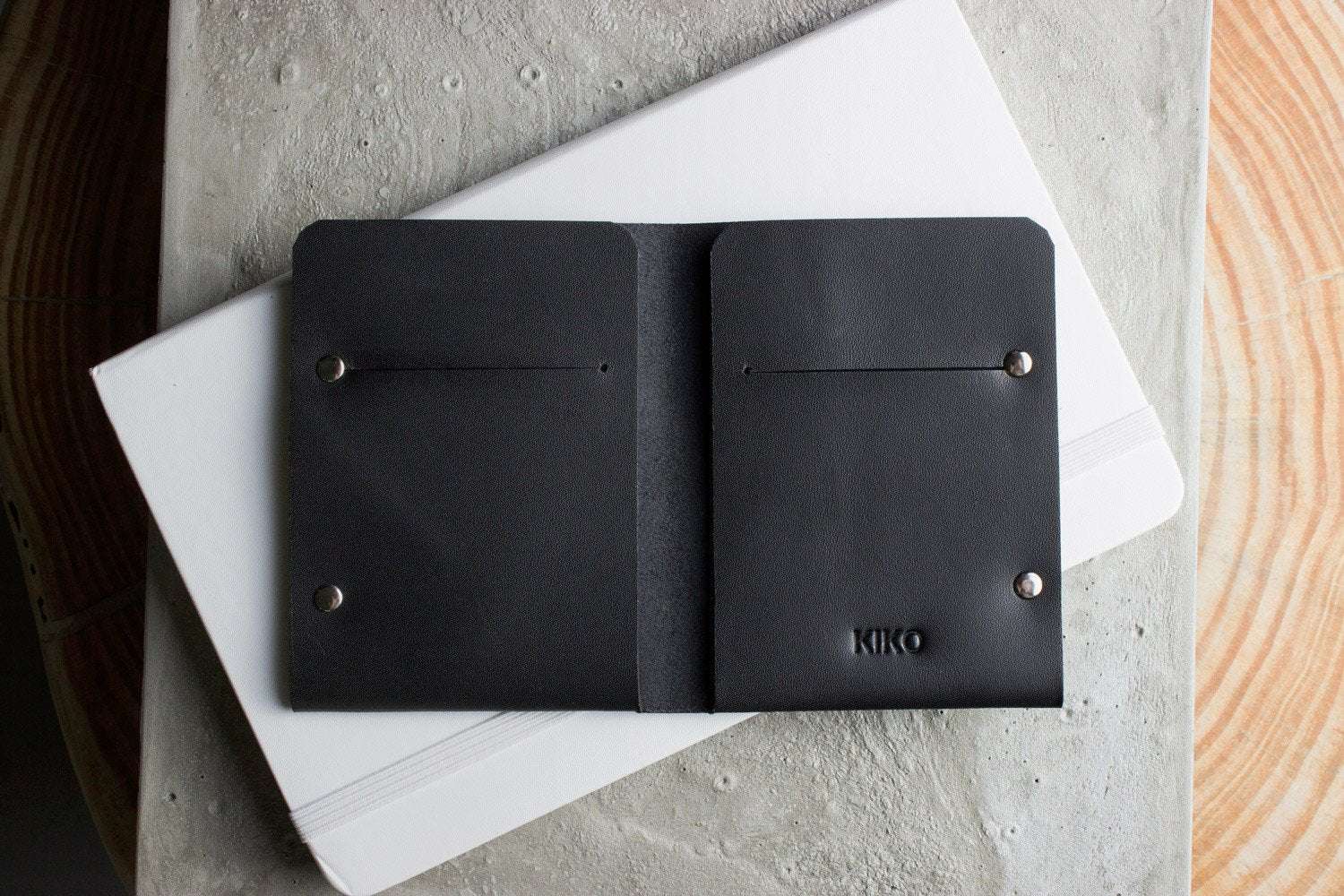 Unstitched leather twofold wallet handcrafted from vegetable-tanned cowhide with billfold and card slots