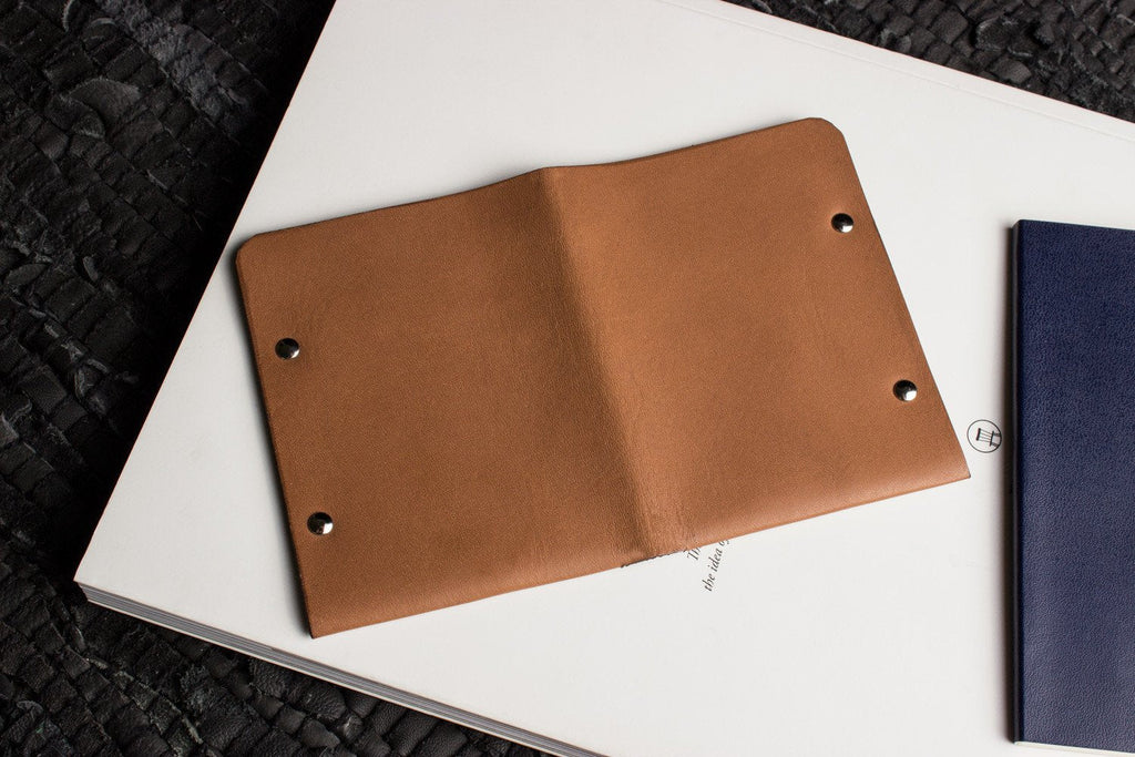 Unstitched leather twofold wallet made from vegetable-tanned cowhide with billfold and card slots