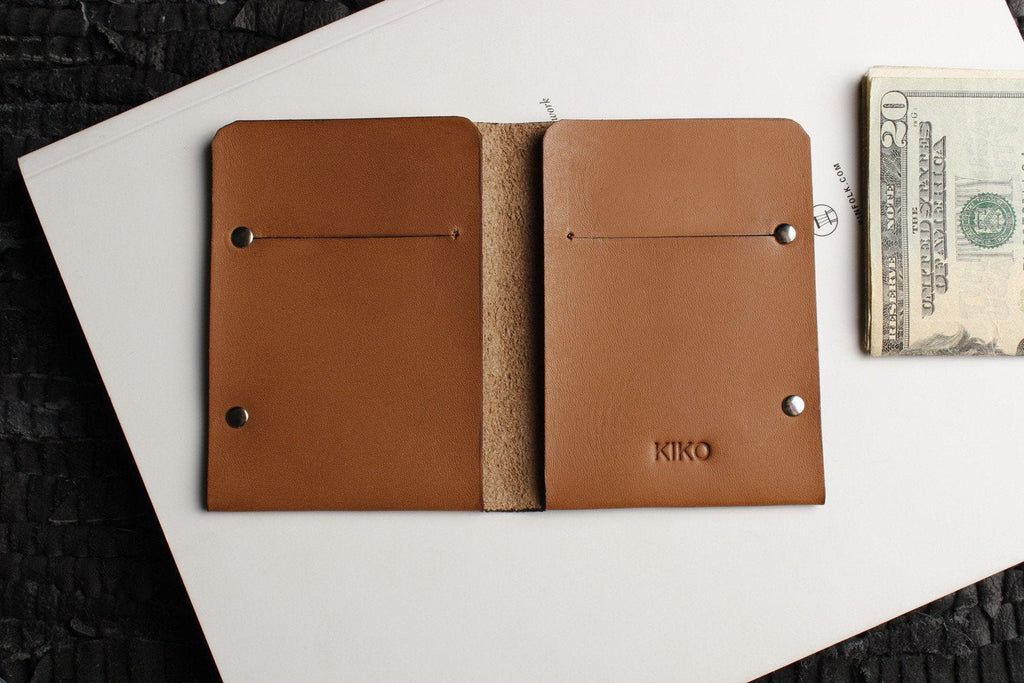 Unstitched leather twofold wallet made from vegetable-tanned cowhide with billfold and card slots