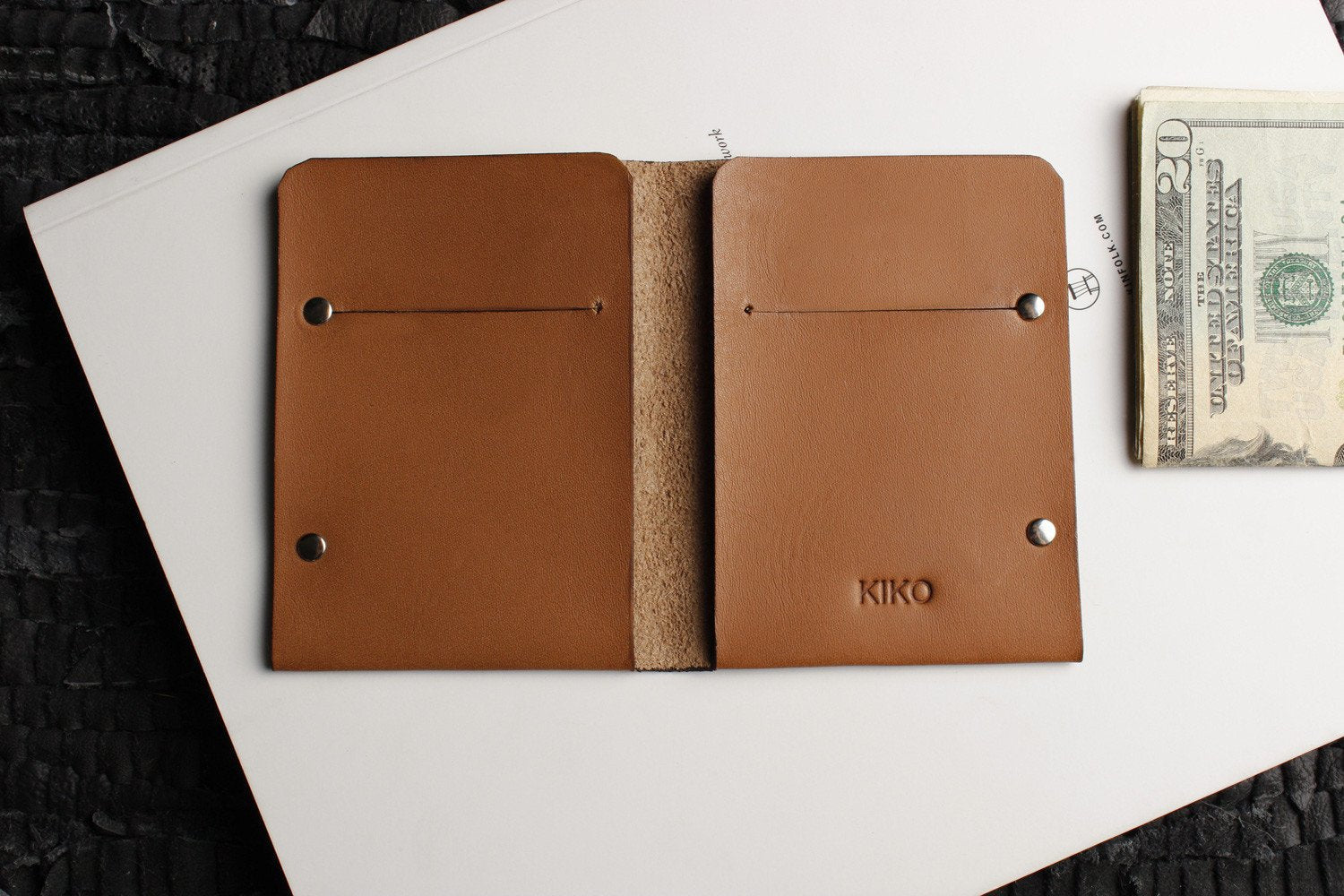 Unstitched leather twofold wallet made from vegetable-tanned cowhide with billfold and card slots