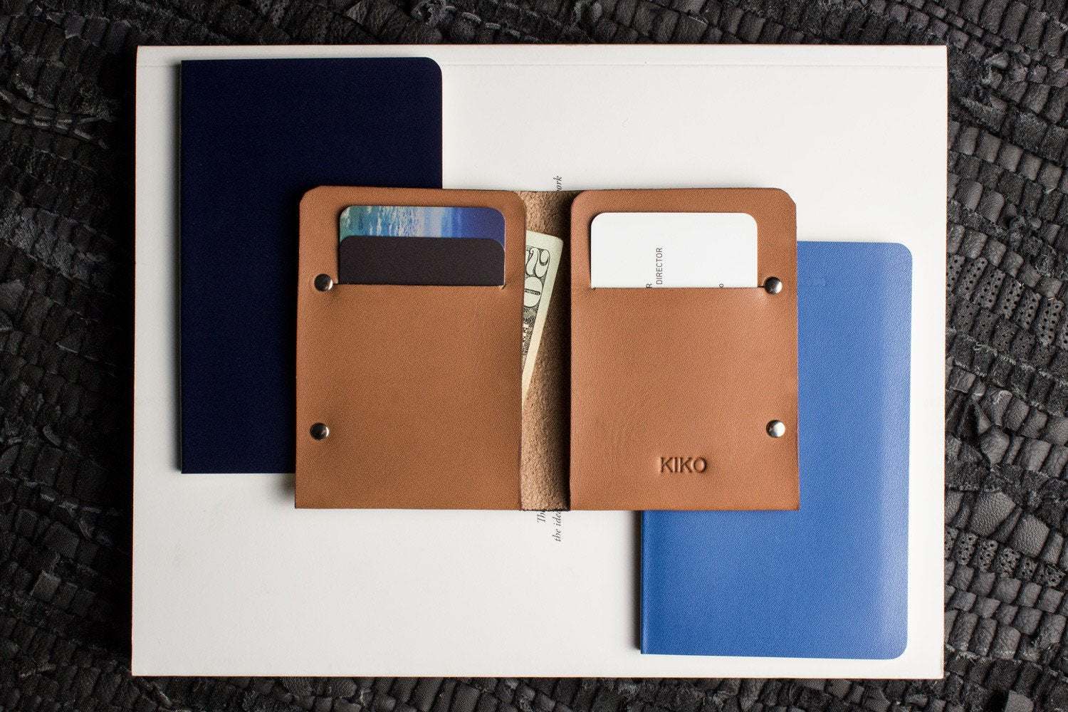 Unstitched leather twofold wallet made from vegetable-tanned cowhide with billfold compartment and card slots