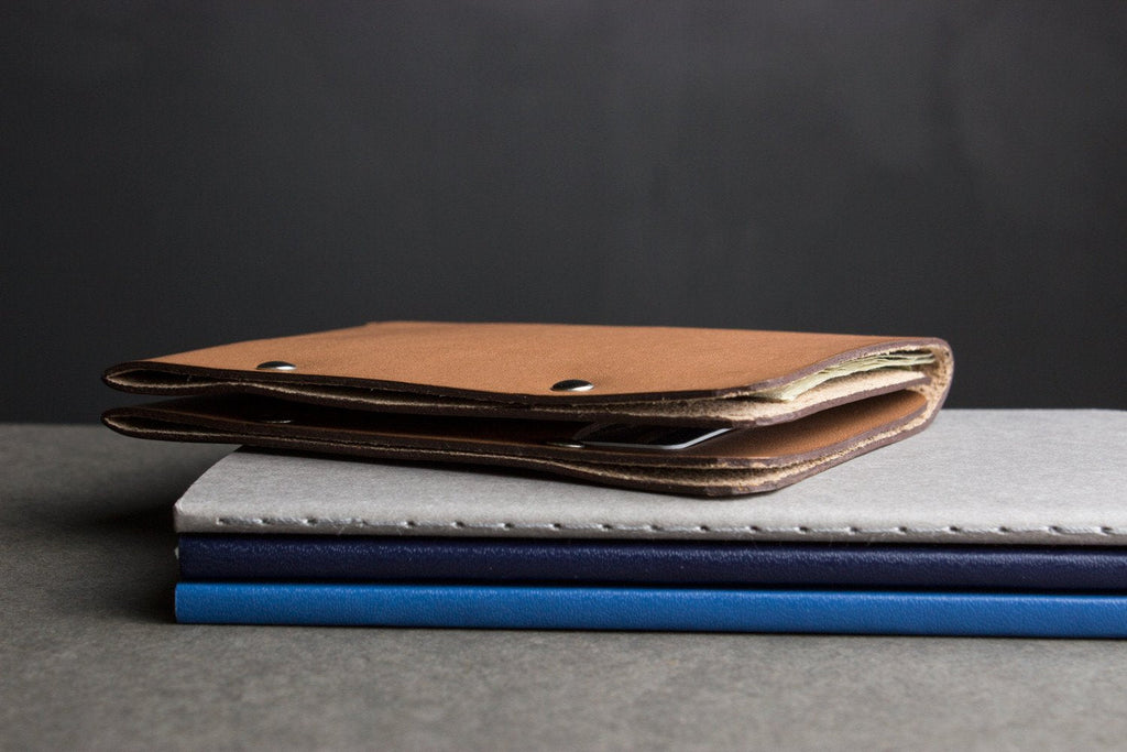 Unstitched leather wallet made from vegetable-tanned cowhide with two card slots and billfold compartment
