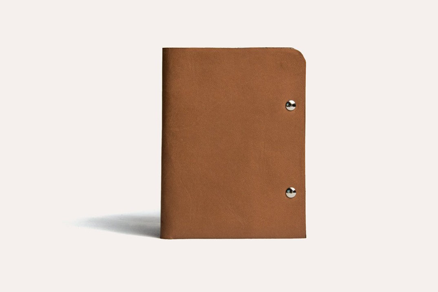 Unstitched leather twofold wallet made from vegetable-tanned cowhide with full-length billfold and two card slots