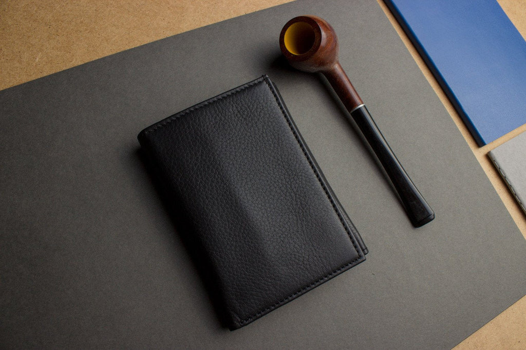 Leather trifold wallet made of butter soft full grain cowhide with nine card slots and ID window