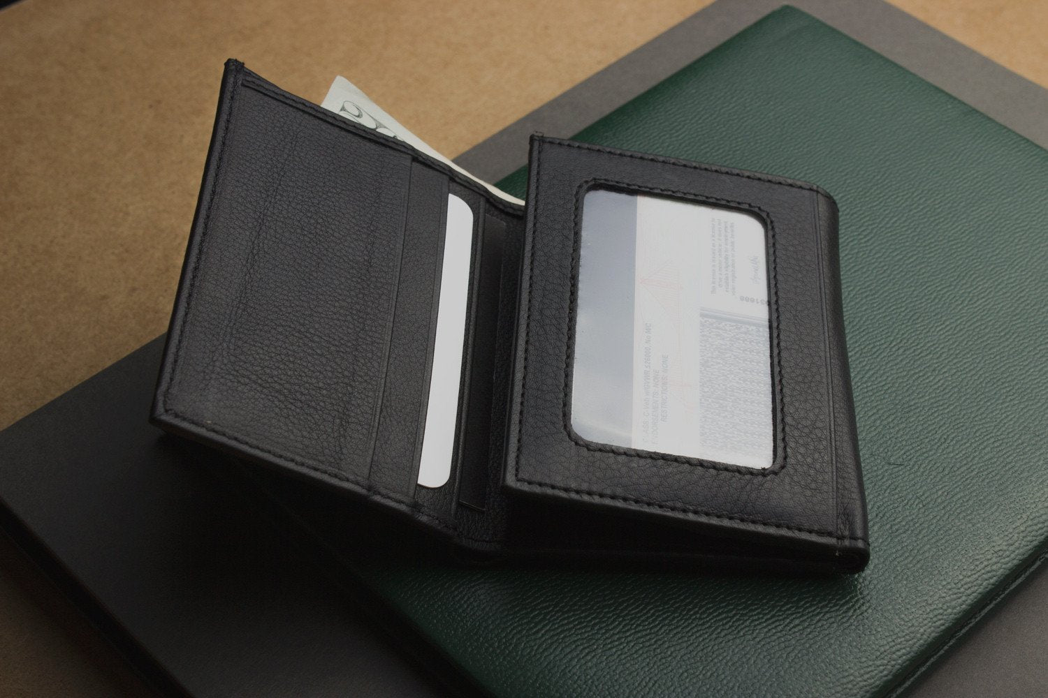 Kiko leather trifold wallet made from butter soft full grain cowhide leather with 9 card slots and ID window