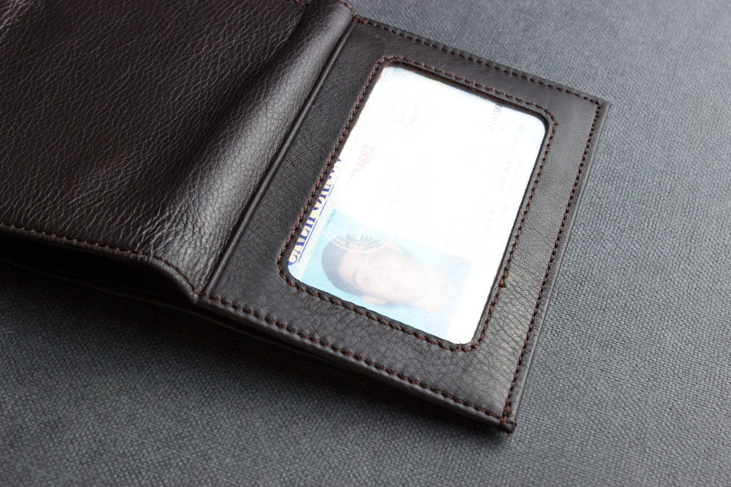 Kiko leather trifold wallet made from soft full grain cowhide with multiple card slots and ID window