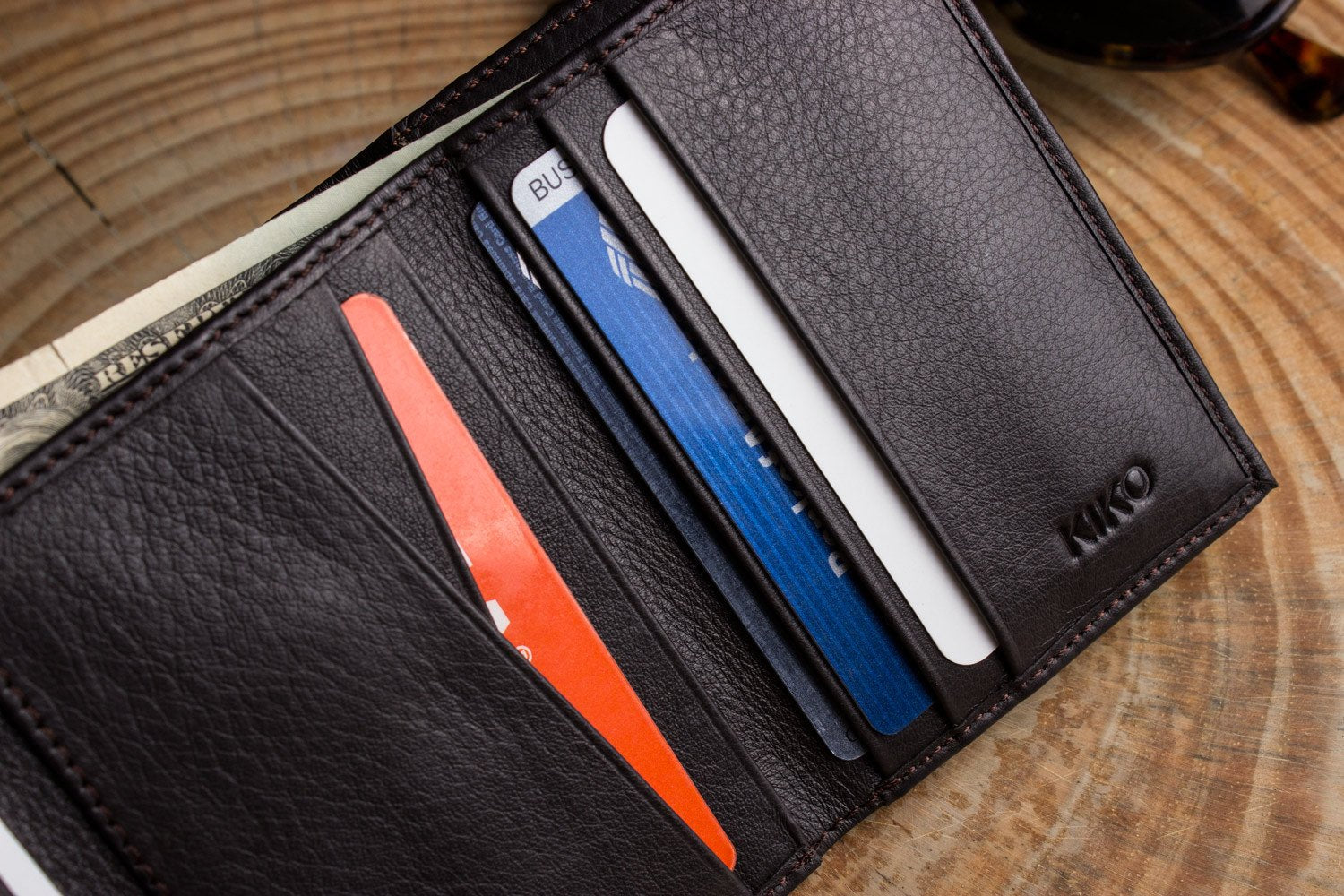 Kiko leather trifold wallet made of butter soft full grain cowhide with 9 card slots and ID window