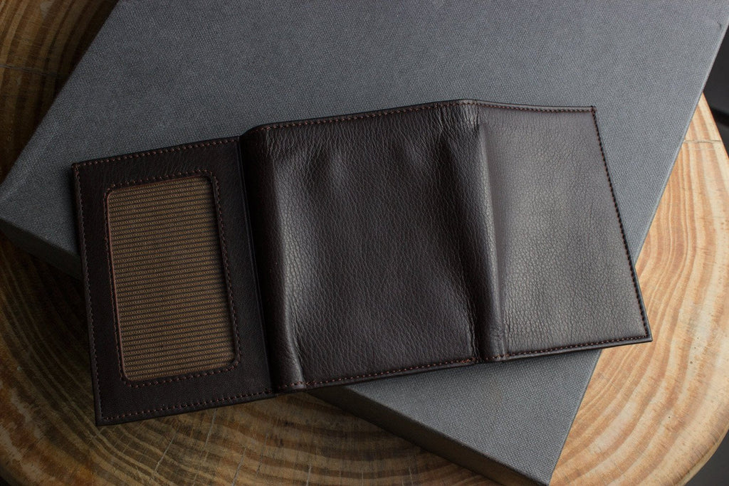 Kiko leather trifold wallet made from full grain cowhide with 9 card slots and ID window