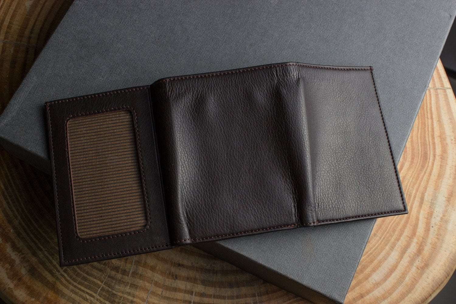 Kiko leather trifold wallet made from full grain cowhide with 9 card slots and ID window