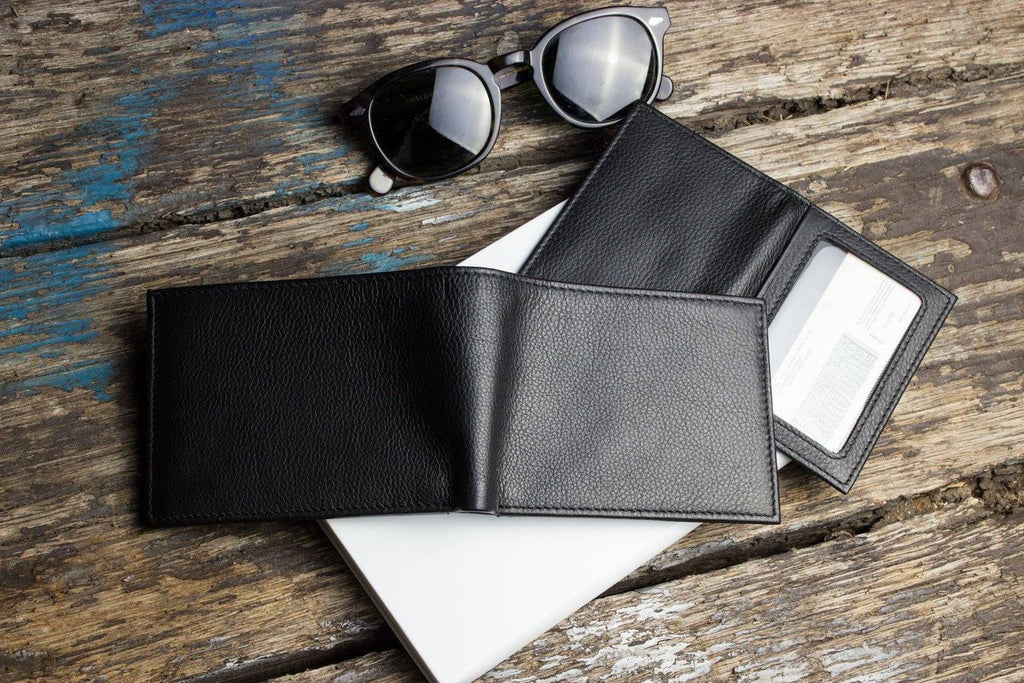 Traditional bifold wallet made of glove-tanned cowhide leather with multiple card slots and ID window