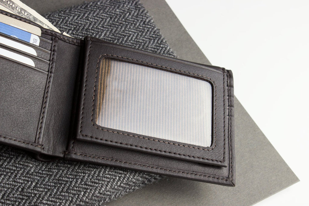 Traditional bifold wallet made of glove-tanned cowhide leather with multiple card slots and ID window, neatly stitched for a classic look