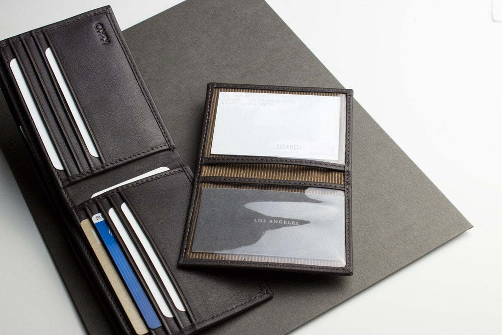 Traditional bifold wallet made from glove tanned cowhide leather with multiple card slots and removable ID window