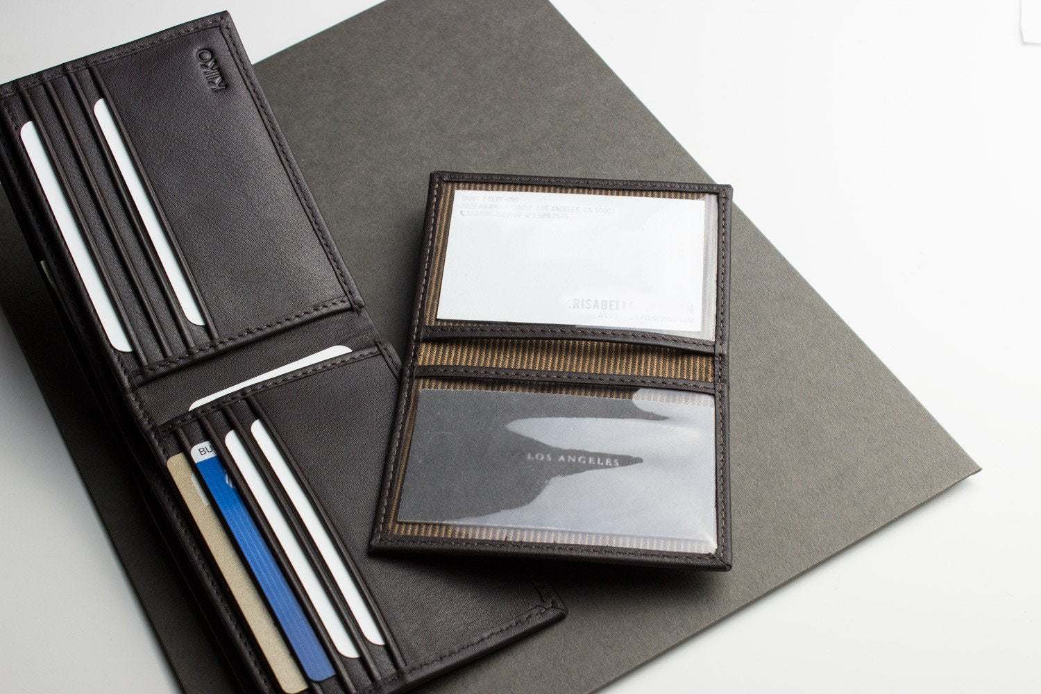 Traditional bifold wallet made from glove tanned cowhide leather with multiple card slots and removable ID window