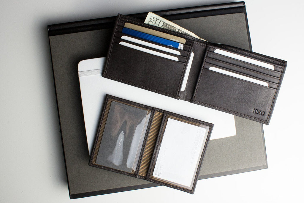 Traditional bifold wallet made of glove tanned cowhide leather with multiple card slots and ID window
