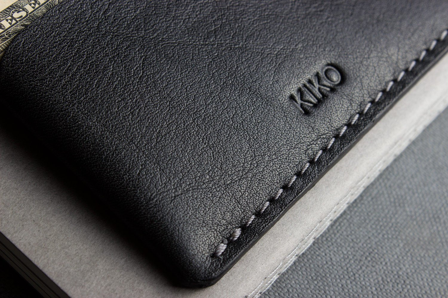 Handcrafted top grain leather triple pocket card wallet with contrast stitching and slim design