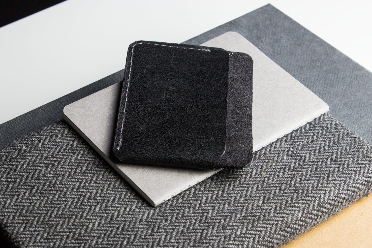 Minimalist handcrafted triple pocket card wallet in top grain cowhide leather with contrast stitching