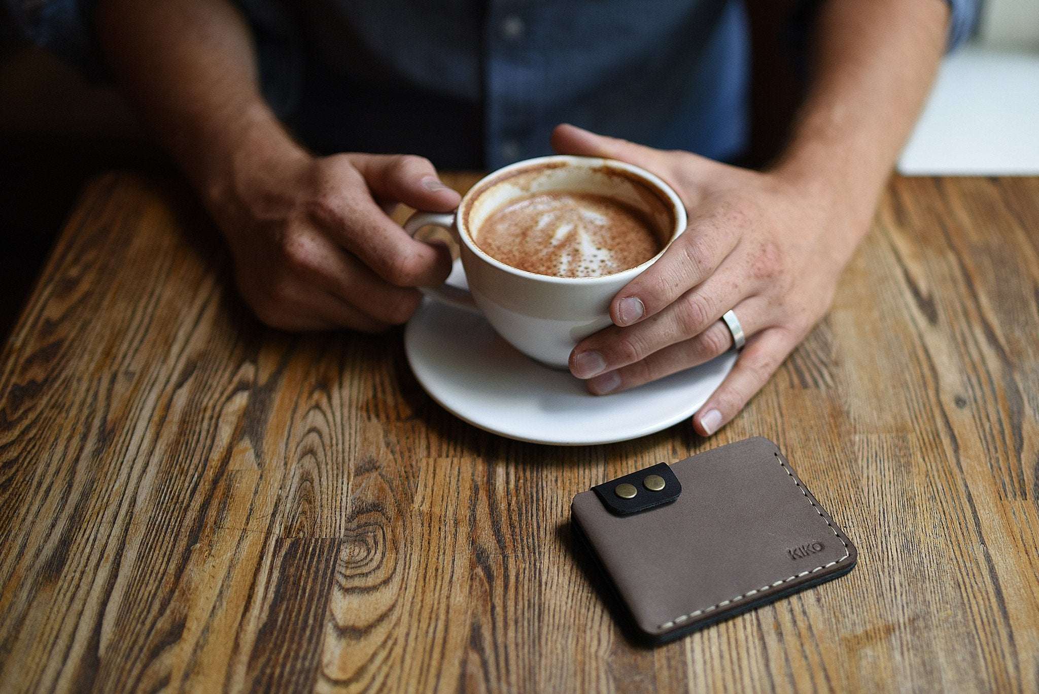 Slim Kiko Card Wallet in smooth leather with brass buttons and secure flap closure