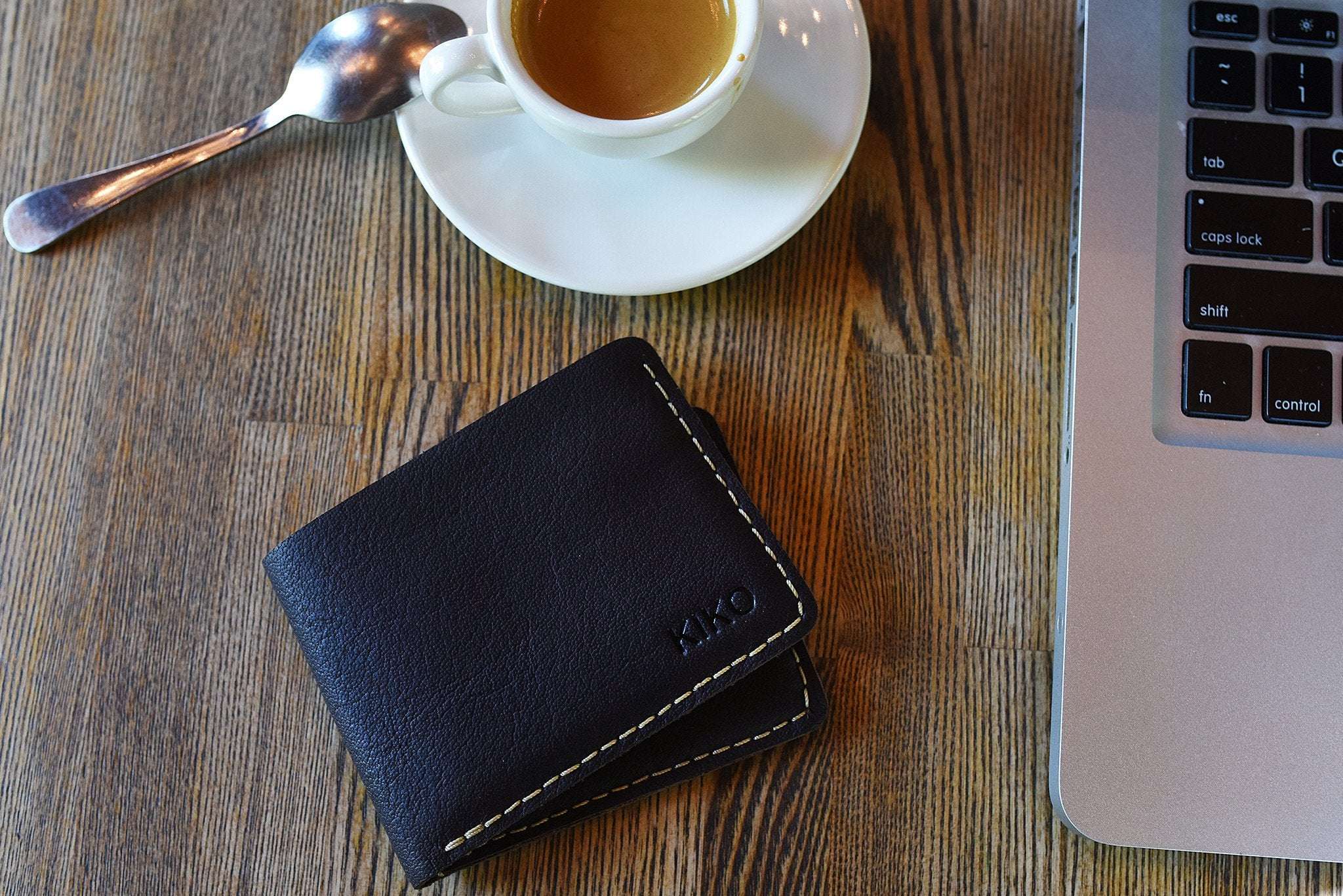 Wave Bifold Leather Wallet with six card slots and crisp light stitching