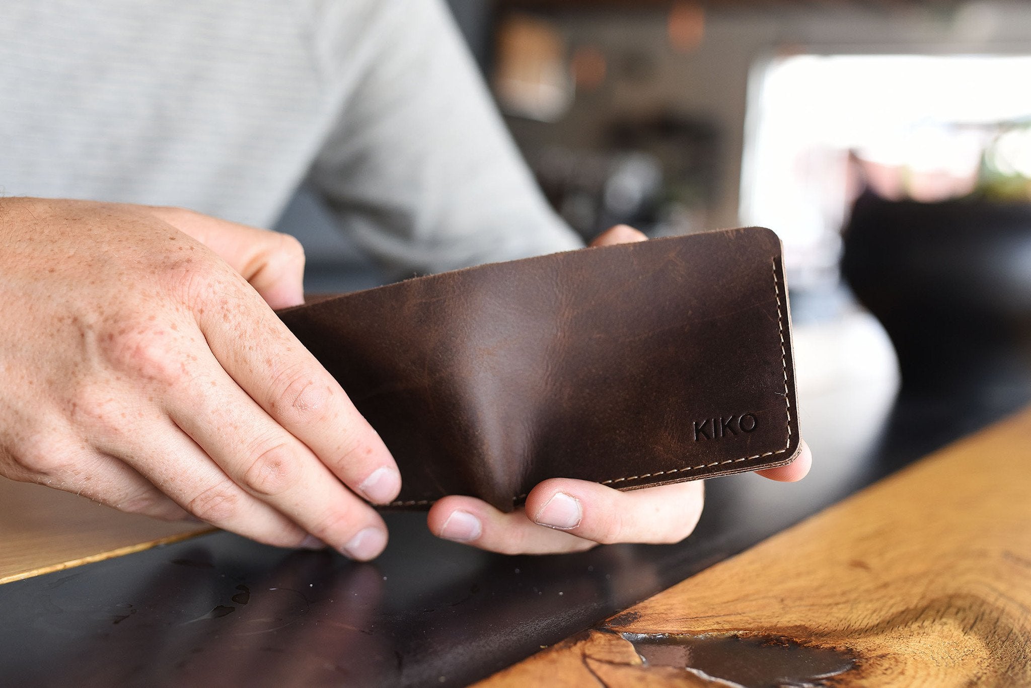 Kiko Straight Cut Bifold Wallet in distressed dark brown leather with four card slots and full-length bill compartment