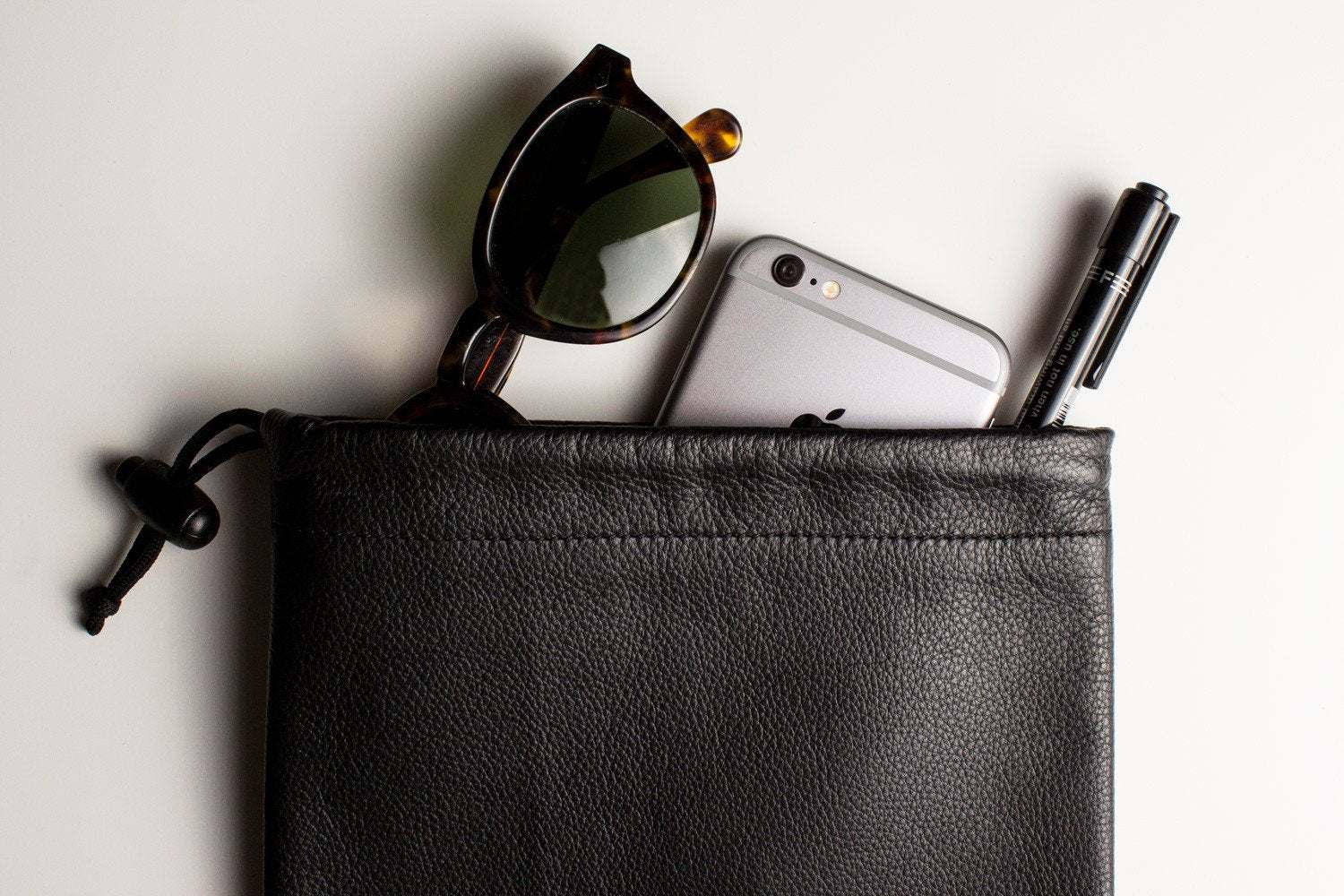 Kiko Much Needed Accessory Pouch in suede lined cowhide leather with adjustable pull string closure