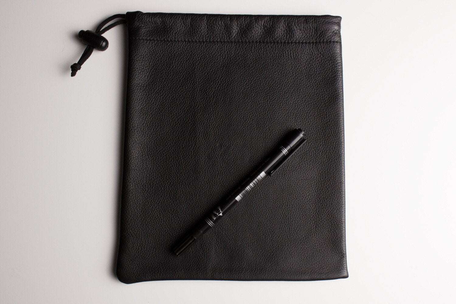 Kiko Much Needed Accessory Pouch cowhide leather with adjustable pull string closure