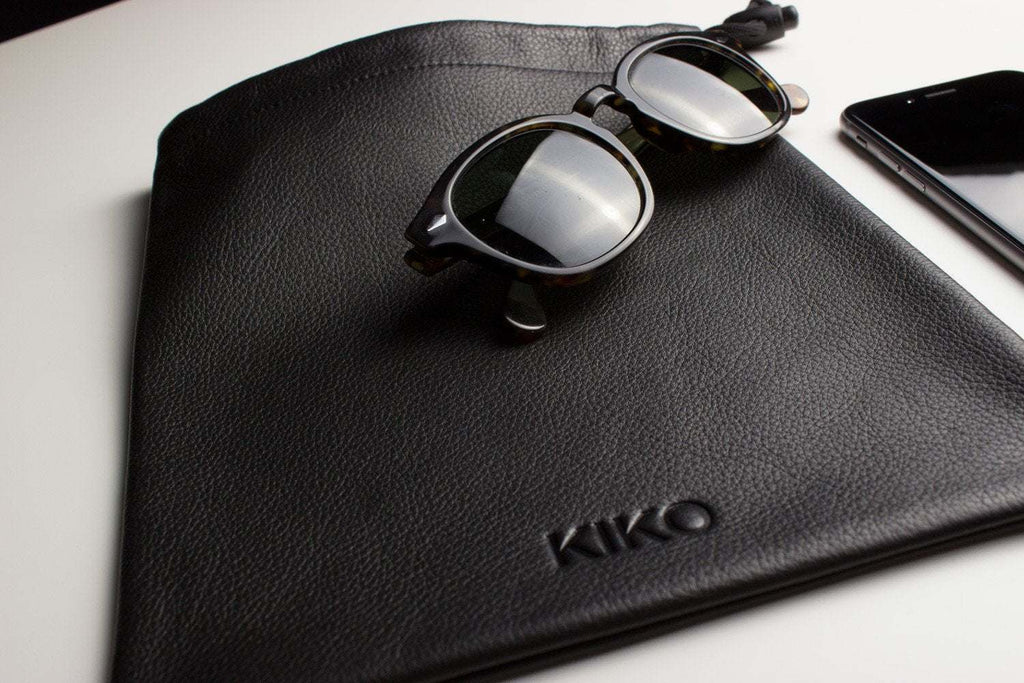 Kiko much needed accessory pouch made of cowhide leather with adjustable pull string closure and suede lining