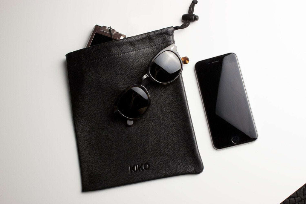 Kiko Much Needed Accessory Pouch cowhide leather with adjustable pull string closure and suede lining