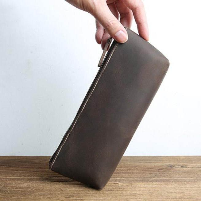 Handmade leather makeup bag in full-grain crazy horse leather with YKK zipper and sleek design
