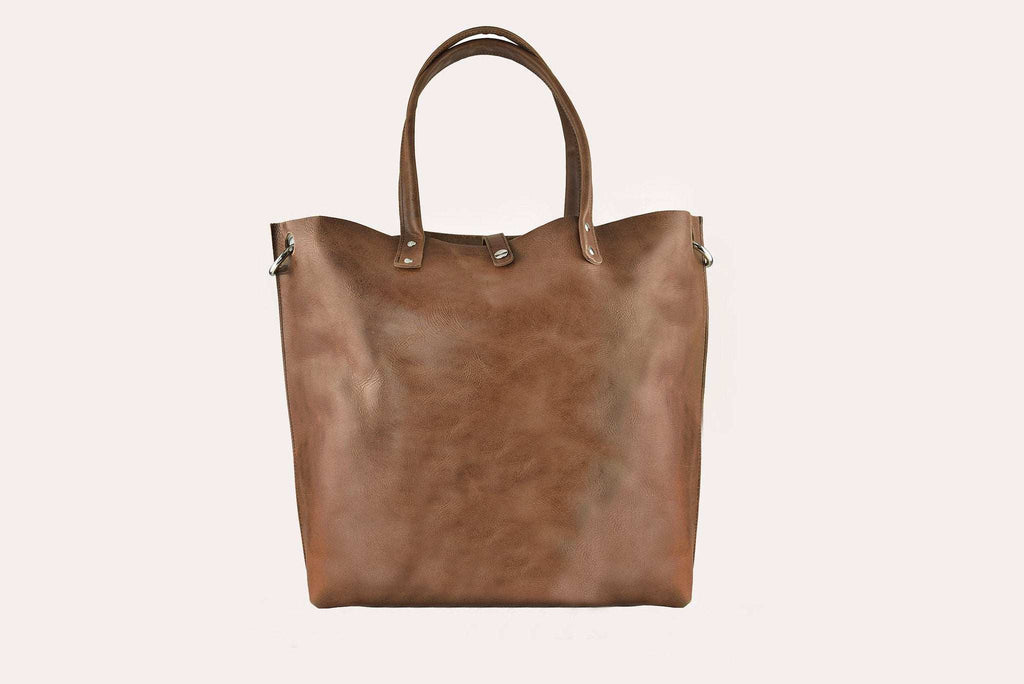 Caramel leather Paseo Shoulder Bag with removable strap and button closure