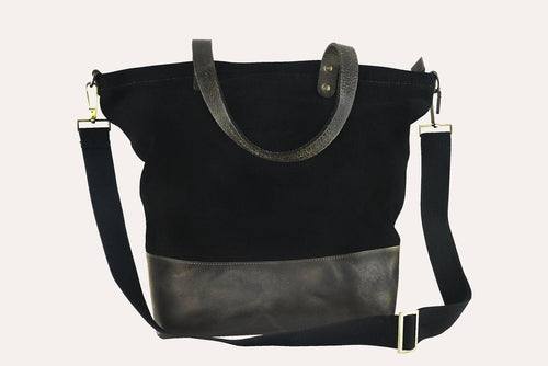 Kiko Boyfriend Canvas Shoulder Bag with brown leather bottom and canvas straps, spacious interior and zippered closure