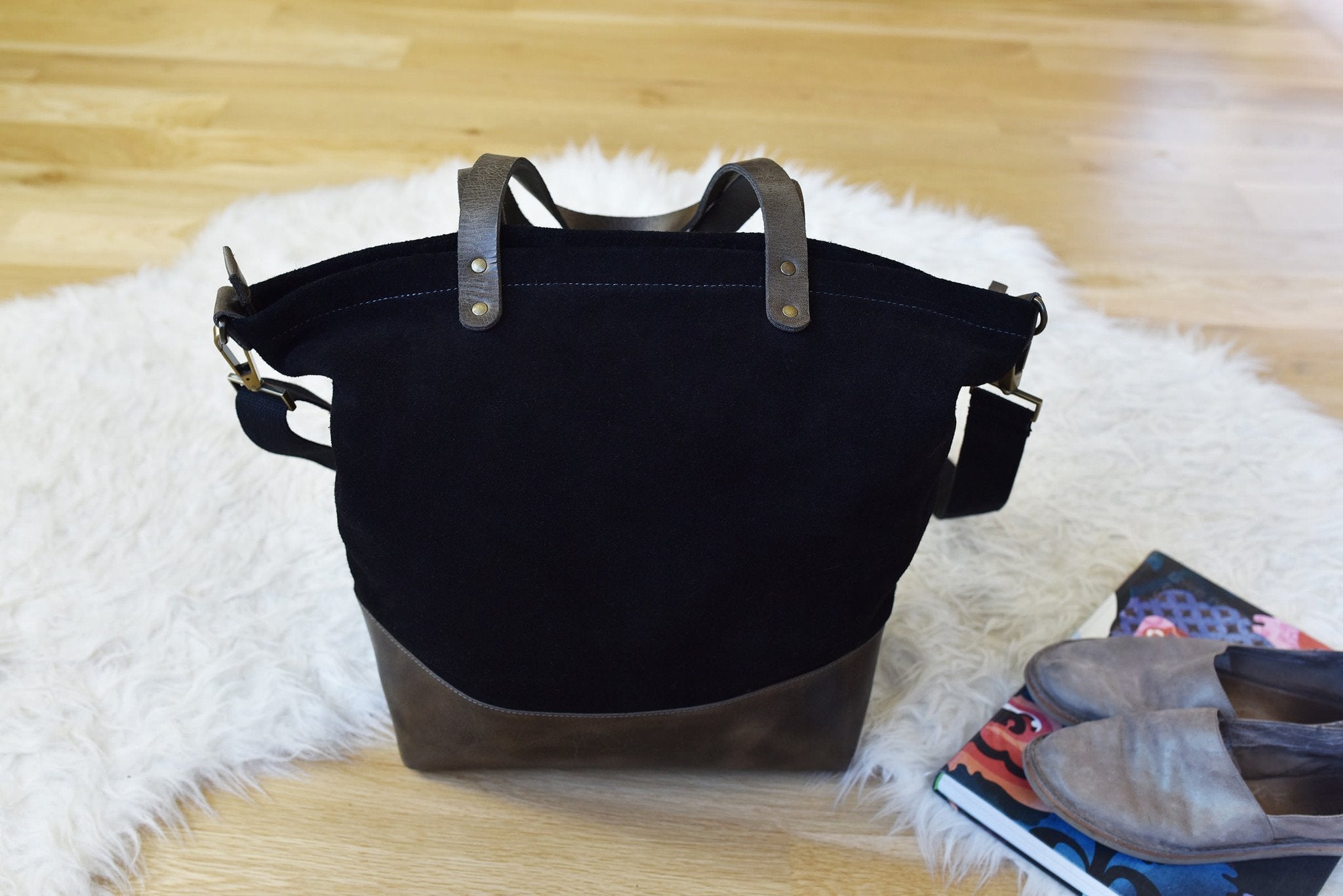 Kiko Boyfriend Canvas Shoulder Bag with leather bottom, canvas straps, and spacious pockets