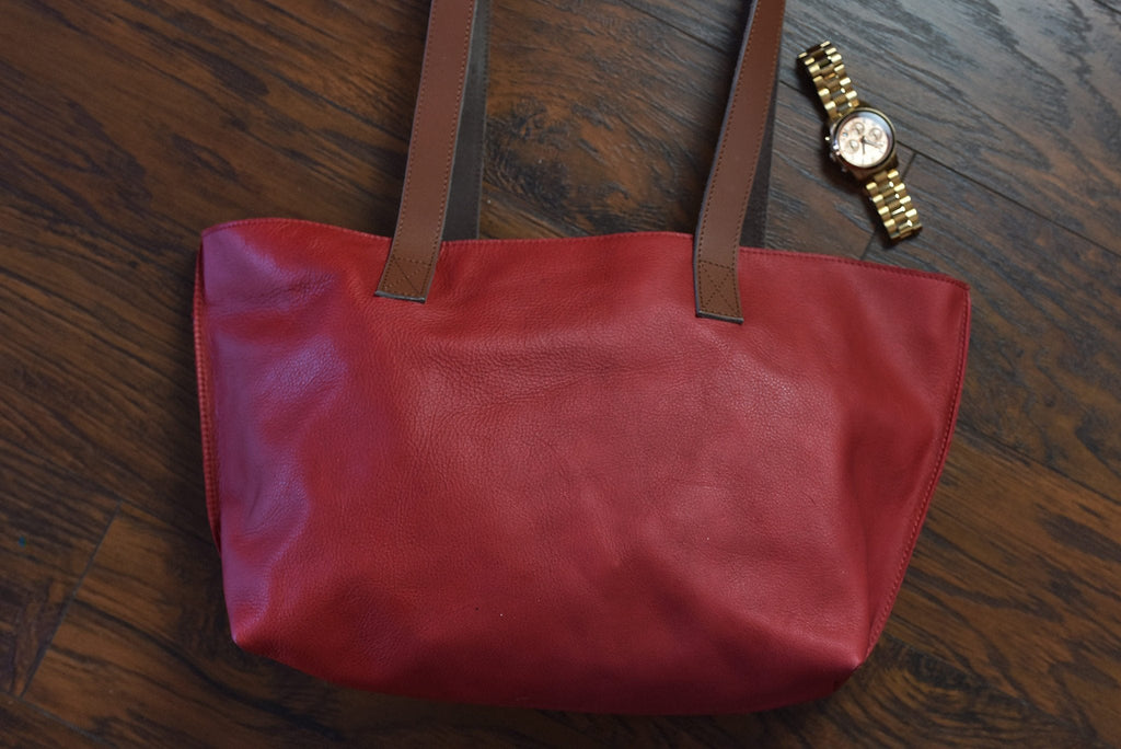 Red genuine leather tote bag with bowl-shaped silhouette and center handles