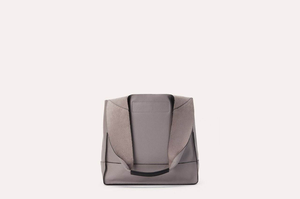 Genuine pebble leather Kiko modern design shoulder bag with leather tie closure and internal pockets