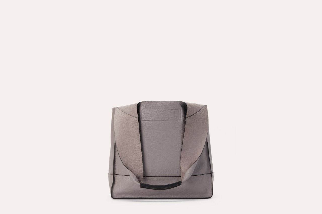 Genuine pebble leather Kiko modern design shoulder bag with leather tie closure and internal pockets