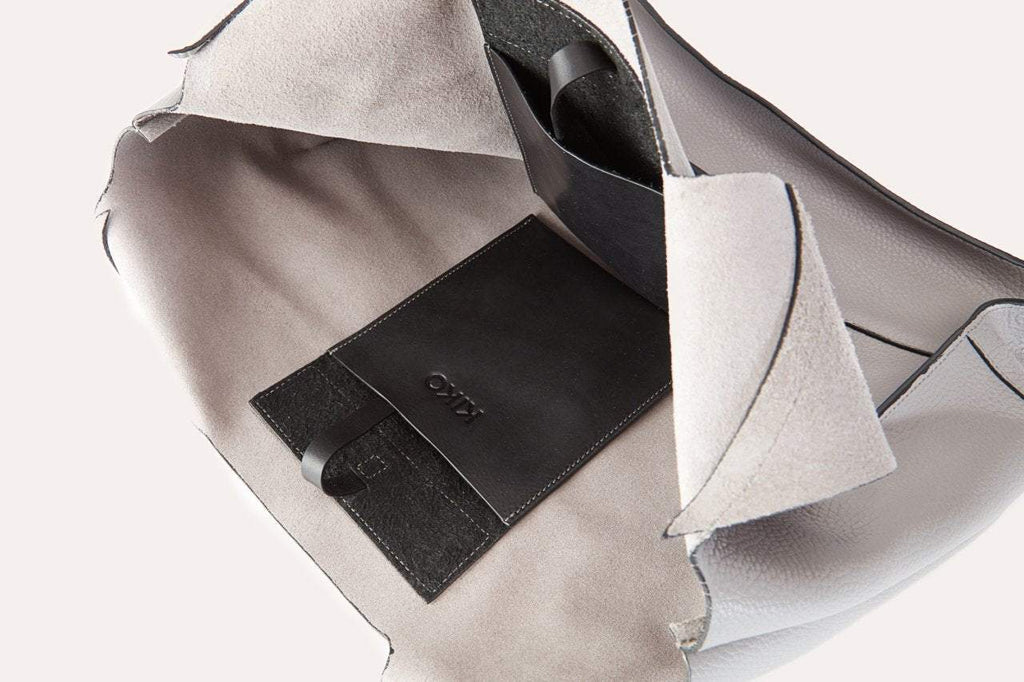 Genuine pebble leather Kiko modern design shoulder bag with leather tie closure and internal pockets