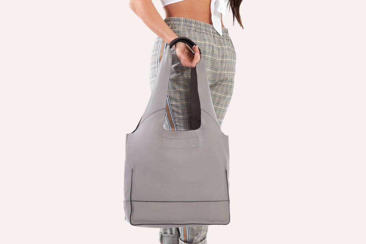 Genuine pebble leather modern design shoulder bag with leather tie closure and dual internal pockets