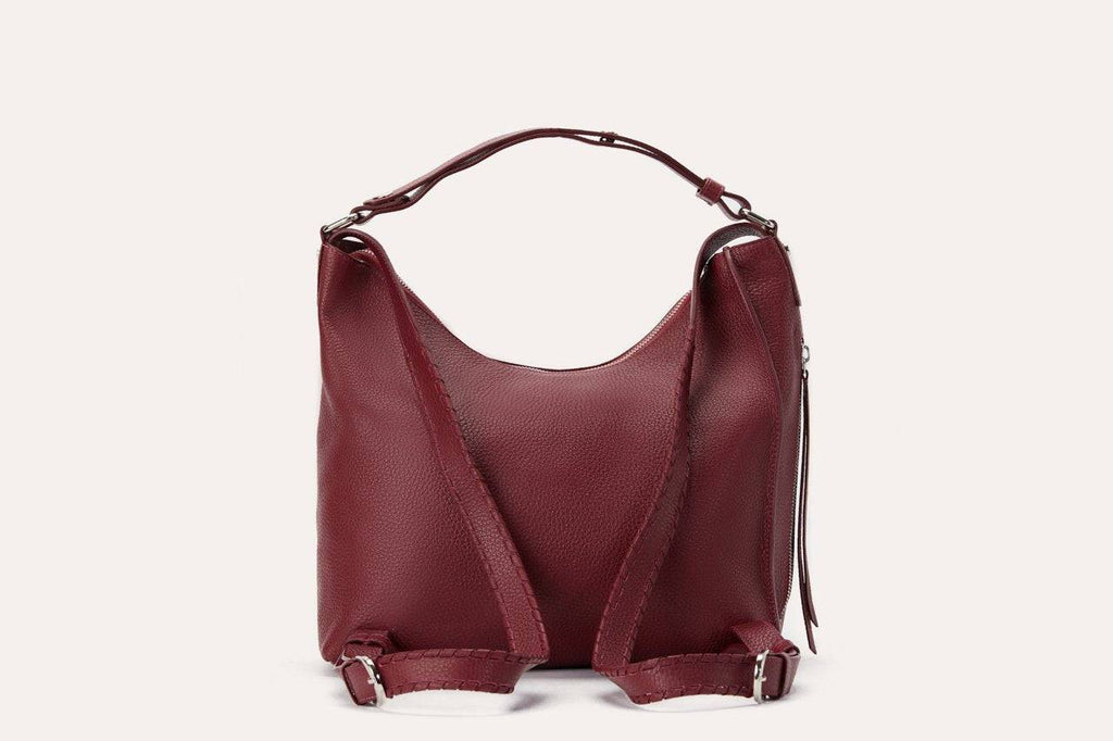 Kiko versatile shoulder bag in genuine pebble leather with adjustable straps and multiple pockets