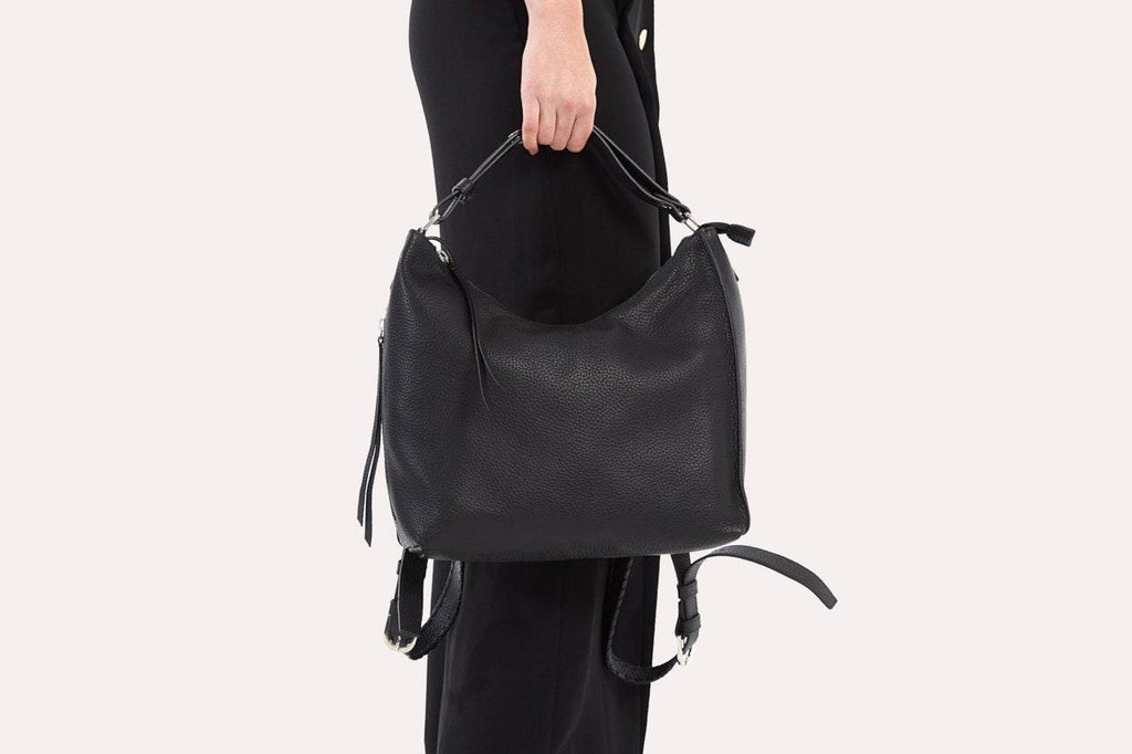 Genuine pebble leather versatile shoulder bag with adjustable straps and multiple pockets for modern style and functionality