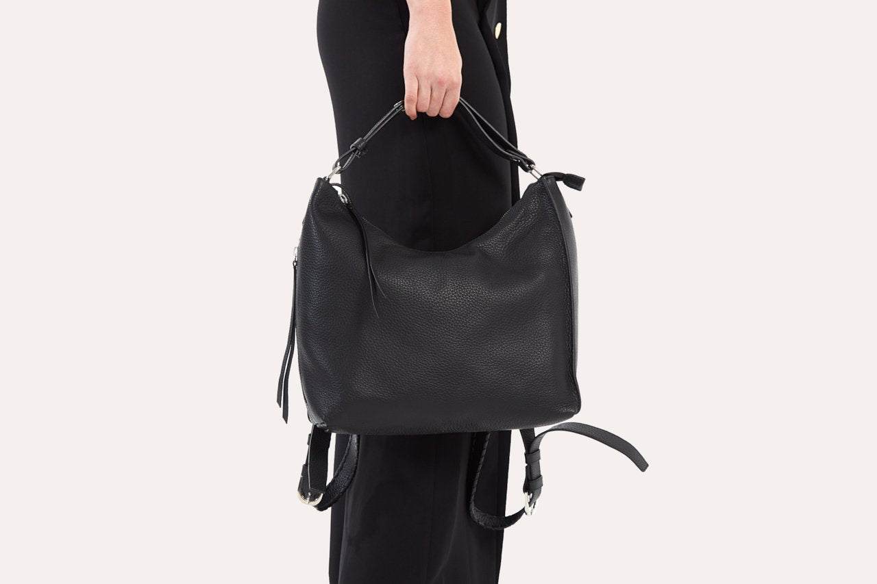 Genuine pebble leather versatile shoulder bag with adjustable straps and multiple pockets for modern style and functionality