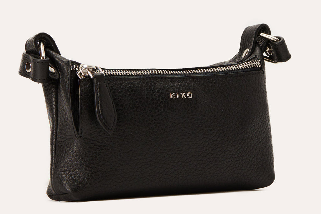Genuine pebble leather crossbody bag with adjustable strap and zipper pockets