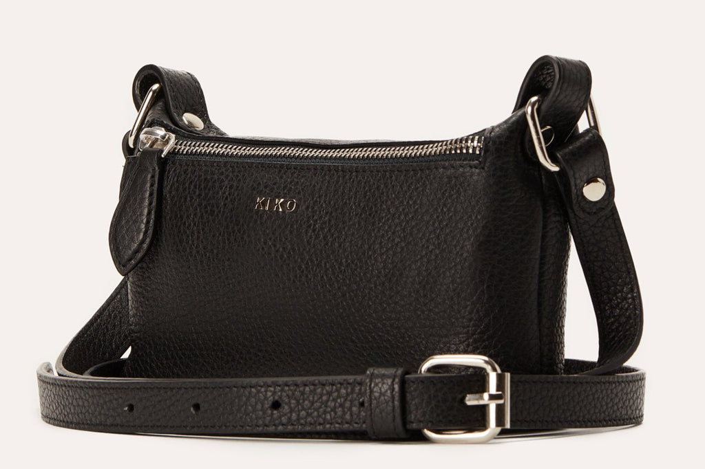 Genuine pebble leather crossbody bag with adjustable strap and multiple compartments for daily essentials