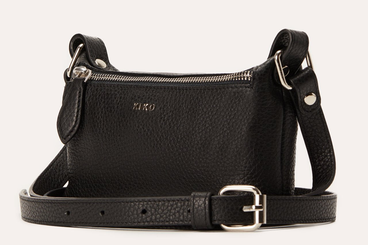 Genuine pebble leather crossbody bag with adjustable strap and multiple compartments for daily essentials