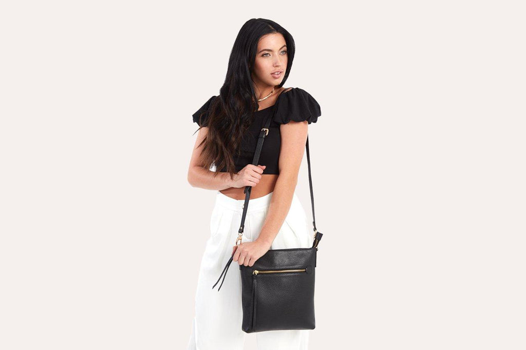 Kiko genuine pebble leather crossbody bag with external zipper pocket and adjustable strap