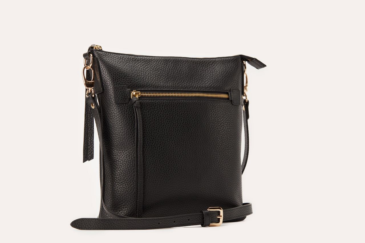 Kiko genuine pebble leather crossbody bag with external zipper pocket and adjustable strap