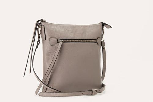 Genuine pebble leather crossbody bag with external zipper pocket and adjustable strap