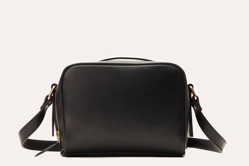 Kiko boxed crossbody bag in genuine leather with top handle and adjustable strap