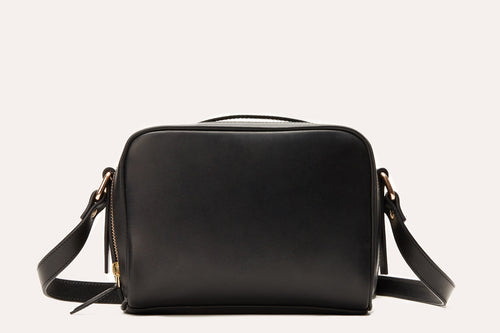 Kiko boxed crossbody bag in genuine leather with top handle and adjustable strap