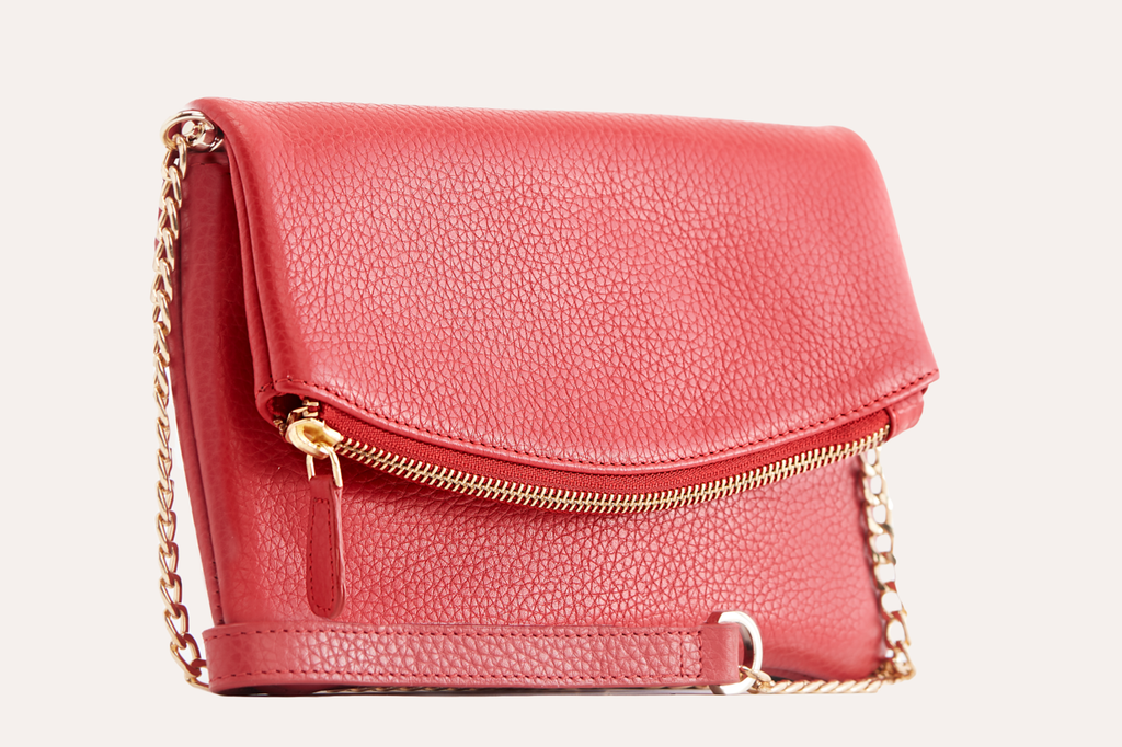 Kiko flap clutch bag in genuine pebble leather with removable chain strap and magnetic closure